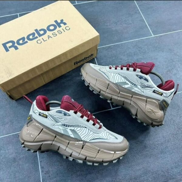 Reebok Classic Sneakers with Aggressive Tread Pattern | Tconcorde