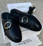 Alexander McQueen Black Leather Mule Shoes with Gold Buckle | Tconcorde