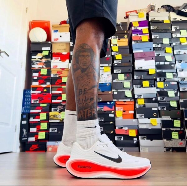 Nike ZoomX Running Shoes for Men - White with Black Swoosh and Red Sole | Tconcorde