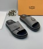 Grey UGG Slide Sandals with Gold Accents and Stitched Sole | Tconcorde