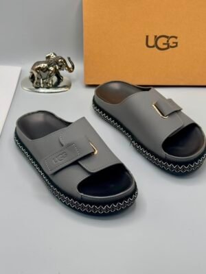 Grey UGG Slide Sandals with Gold Accents and Stitched Sole | Tconcorde