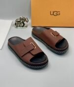 Grey UGG Slide Sandals with Gold Accents and Stitched Sole | Tconcorde
